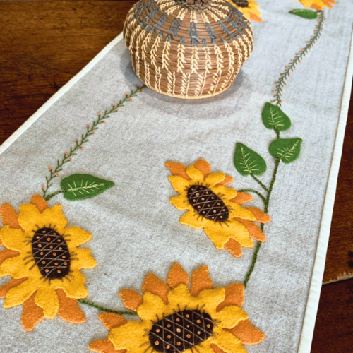 Carried Away Designs linen-colored long table runner with sunflowers